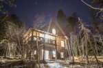 Outback Log cabin at night